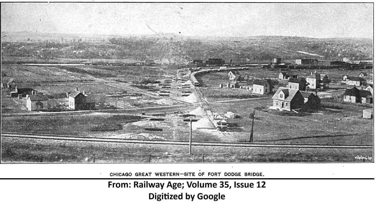 Overview of construction site, showing temporary railroad used for construction